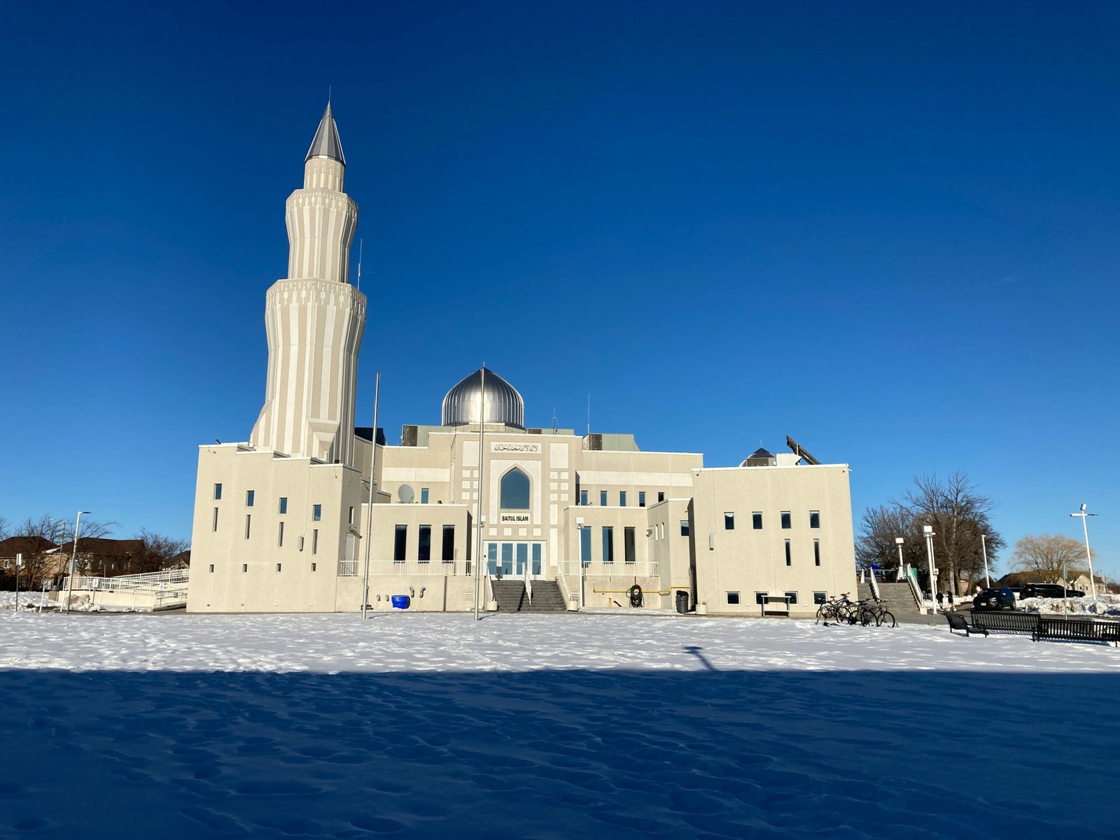 a large white building with a tall tower